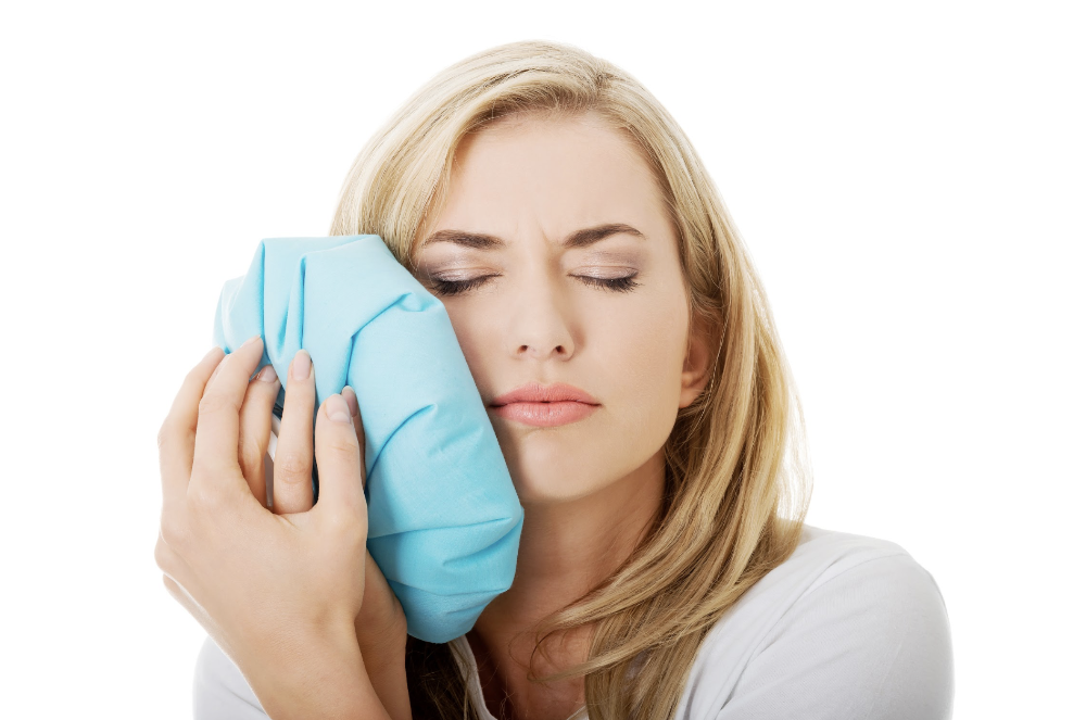 tooth extraction mccrae | woman with toothache